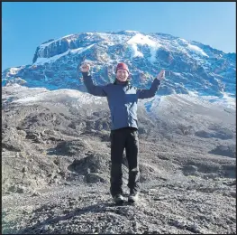  ??  ?? Andrew Thomlinson took on the challenge of conquering Mount Kilimanjar­o