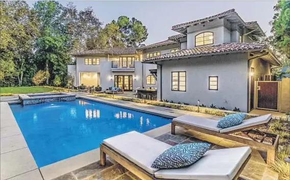  ?? Shooting LA ?? ACTRESS VIOLA DAVIS’ new property in Toluca Lake has a patio with an outdoor living room and a saltwater swimming pool.