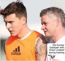  ??  ?? Ole Gunnar Solskjaer with Victor Lindelof during training