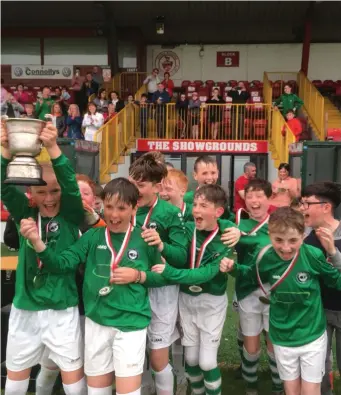  ??  ?? Strand Celtic U12s celebrate winning the league final after a brilliant game with Arrow Harps.