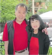  ??  ?? YMCA board chair and past-chair of the Calgary Police Commission Howie Shikaze and his wife Sher Shikaze were among those in attendance at the event in the Mount Royal gardens of philanthro­pists Michael and Linda Shaikh.