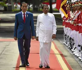  ?? —AFP ?? BELIEVERS IN BRUTE FORCE Both Sri Lankan President Maithripal­a Sirisena (right) and Indonesian President Joko Widodo believe in a brutal crackdown against drugs.