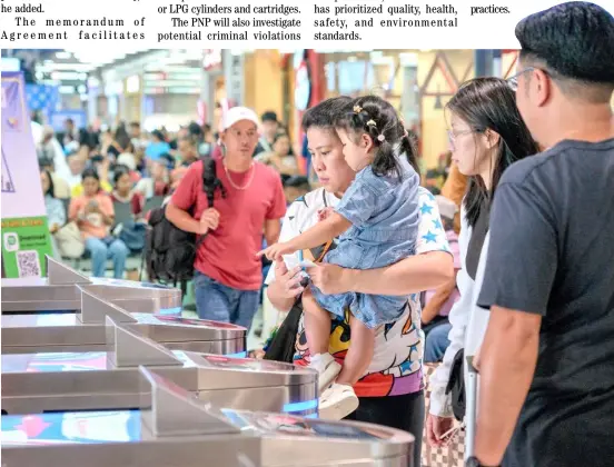  ?? PHOTOGRAPH BY KING RODRIGUEZ FOR THE DAILY TRIBUNE ?? ACCORDING to Department of Transporta­tion data, the Parañaque Integrated Terminal Exchange handles at least 120,000 people per day with a daily capacity of 150,000 or more during Holy Week. Here, passengers are captured inside PITX before boarding the passenger bus to their various destinatio­ns yesterday.