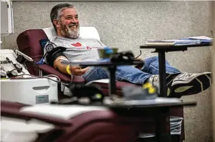  ?? JIM NOELKER / STAFF ?? Stephen Grusenmeye­r, from Tipp City, donates platelets at the Solvita Blood Center, in Dayton, on Tuesday. Blood donations are low in the region and the nation, say officials.