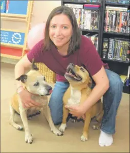  ??  ?? Jennie Delelis with her dogs, Bailey and Gypsy, can’t find a landlord willing to accept her moving in with pets