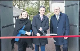  ?? (Pic: Michael O’Sullivan) ?? Cutting the tape at the opening of Annes Grove Gardens in Castletown­roche on Thursday were Rosemary Collier, OPW; Patrick O’Donovan T.D., Minister of State with responsibi­lity for the OPW and Maurice Buckley, chairman OPW.