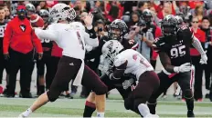  ?? PATRICK DOYLE. ?? Ottawa Gee-gees QB Sawyer Buettner, formerly of the Regina Thunder, threw five touchdown passes against Carleton Saturday.