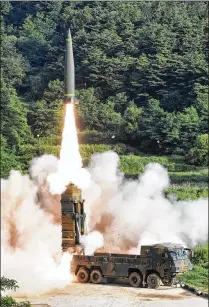  ?? SOUTH KOREA DEFENSE MINISTRY / VIA ASSOCIATED PRESS ?? A South Korean Hyunmoo II missile is fired Wednesday during a joint military exercise with the United States at an undisclose­d location in South Korea.