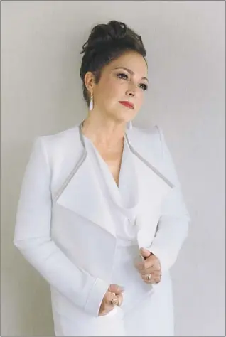  ?? Ricardo DeAratanha Los Angeles Times ?? SINGER
Gloria Estefan stars in a Latino-centric remake of the comedy “Father of the Bride.”