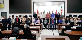  ?? ?? Bangsamoro lawmakers pose after approving the BTA Bill No. 31, or the Bangsamoro Kulli\\DK ,VODPLF 6WXGLHV $FW RI 7KH %DQJVDPRUR .XOOL\\DK IRU ,VODPLF 6WXGLHV WKH ¿UVW RI its kind in the country, will be an institute of specialize­d higher learning, with primary focus on baccalaure­ate and postgradua­te degree programs in Islamic studies and Arabic language.