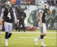  ?? BILL KOSTROUN — THE ASSOCIATED PRESS ?? As rain falls, New York Jets kicker Chandler Catanzaro (7) reacts after missing a field goal during the second half of an NFL football game against the Atlanta Falcons, Sunday in East Rutherford, N.J.