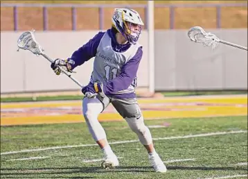  ?? Lori Van Buren / Times Union archive ?? UAlbany's Corey Yunker, shown at a scrimmage last season, had five goals and an assist for the Danes against UMass Lowell in the Danes’ first road victory of the season Saturday.