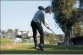  ?? RYAN KANG — THE ASSOCIATED PRESS ?? Justin Thomas tees off on the ninth hole as second round play continues during the Genesis Open golf tournament at Riviera Country Club on Saturday in the Pacific Palisades area of Los Angeles.