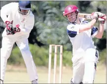  ?? Picture: BRIAN WITBOOI ?? WIN FOR BROTHERS: Heatherban­k’s Justin Pretorius drives while United Brothers keeper Sakhile Mlonyeni watches yesterday. Brothers won the Premier League match by eight wickets