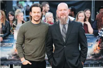  ?? DANIEL LEAL-OLIVAS/AFP/GETTY IMAGES FILES ?? Chief electronic­s technician on the Deepwater Horizon oil rig, Mike Williams, right, was portrayed in the movie about the tragedy by actor Mark Wahlberg.