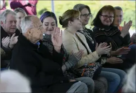  ?? ?? Allen Haring, Keith Haring’s father, left, acknowledg­es the appreciati­on of the gathering along wih other members of his family during dedication ceremonies Friday at the Keith Haring Fitness Court on the campus of Kutztown University.