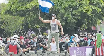  ?? EFE ?? DESAFÍO. Manifestan­tes convocaron a una masiva marcha para este domingo en Managua.