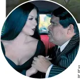  ?? ?? Catherine Zeta-Jones and Luis Guzman play Morticia and Gomez Addams.