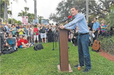  ?? JIM RASSOL/STAFF PHOTOGRAPH­ER ?? Stoneman Douglas student Cameron Kasky speaks at a rally against gun violence at Delray Beach City Hall on Monday.