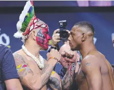  ?? ?? Brazilian Alex Pereira and American foe Jamahal Hill face off during the UFC 300 ceremonial weigh-in in Las Vegas. Picture: Getty