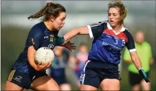  ??  ?? Áine Byrne (right) goes up against Aisling Greene of DCU in the Giles Cup final last weekend.