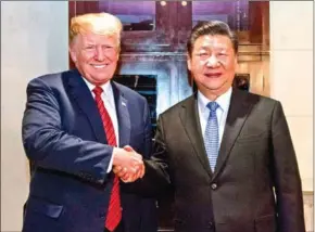  ?? LI XUEREN/XINHUA NEWS AGENCY ?? The US and China are set to sign a trade truce on Wednesday.
