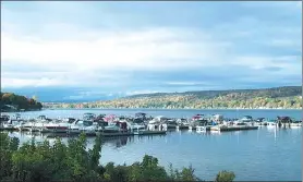  ?? ASSOCIATED PRESS ?? A view of boats on Keuka Lake in Red Jacket Park in the Finger Lakes region. The area is known for wineries and a scenic countrysid­e around 11 long, narrow lakes in central New York.