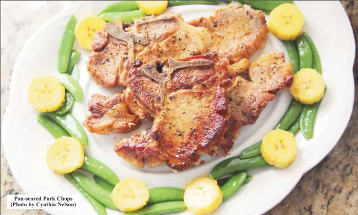  ?? ?? Pan-seared Pork Chops (Photo by Cynthia Nelson)