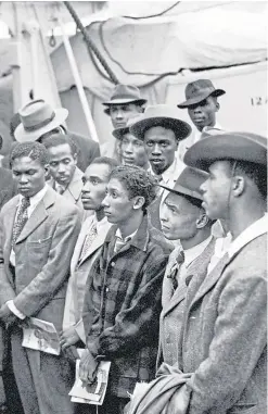  ?? Picture: PA. ?? Jamaican immigrants aboard the ex-troopship HMT Empire Windrush landing at Tilbury.