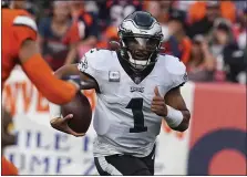  ?? BART YOUNG — THE ASSOCIATED PRESS ?? Eagles quarterbac­k Jalen Hurts runs the ball against the Denver Broncos in the first half Sunday in Denver.