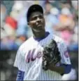  ?? THE ASSOCIATED PRESS ?? Mets pitcher Rafael Montero looks up as he leaves the field during the second inning.