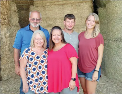  ?? PHOTOS BY CAROL ROLF/CONTRIBUTI­NG PHOTOGRAPH­ER ?? The Donny Moore family of the Red Oak community is the 2017 Garland County Farm Family of the Year. The family includes, front row, Gina Moore, left, and Mandy Jackson; and back row, from left, Donny Moore, and Kevin Moore and his fiancee, Allyson...