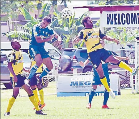  ?? Picture: REINAL CHAND ?? Tavua’s Mavileko Nakama and Lautoka’s Jone Vono Jr contest an aerial ball during their match in the Courts IDC at Prince Charles Park in Nadi.