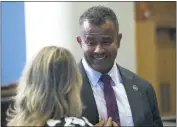  ?? STAFF PHOTOS BY PAUL LAGASSE ?? Del. C.T. Wilson (D-Charles) chats with an audience member prior to Tuesday’s public hearing in La Plata on 2020 legislativ­e proposals from Charles County.