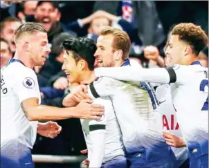  ?? DANIEL LEAL-OLIVAS/AFP ?? Tottenham Hotspur’s South Korean striker Son Heung-min celebrates scoring their third goal during their win over Chelsea at Wembley Stadium on Saturday.