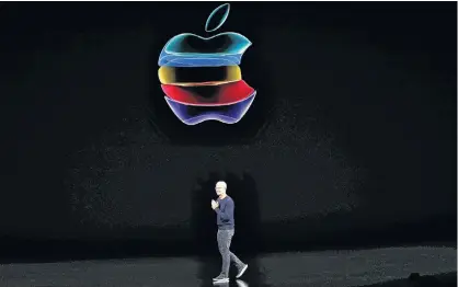  ?? STEPHEN LAM/REUTERS ?? CEO Tim Cook speaks at an Apple event at their headquarte­rs in Cupertino, Calif., last week.