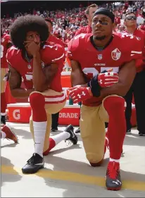  ?? Bay Area News Group / TNS ?? From left, The San Francisco 49ers’ Colin Kaepernick and Eric Reid kneel during the national anthem before their a game against the Dallas Cowboys on Oct. 2, 2016, at Levi’s Stadium in Santa Clara.