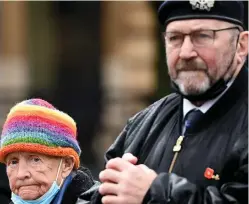  ?? ?? Veterans, serving members of the military and members of the public pay tribute to those who died during conflicts at the opening of the Garden of Remembranc­e