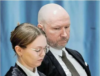  ?? /Reuters ?? Needs some company: Anders Behring Breivik and attorney Marte Lindholm attend a court hearing inside the gymnasium of the highsecuri­ty Ringerike prison at Tyristrand, Norway.