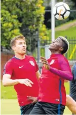  ?? THE ASSOCIATED PRESS ?? Gyasi Zardes, front, and Matt Besler go for a ball during U.S. men’s national team soccer training Monday at Lipscomb University in Nashville. The team is preparing for a friendly against Ghana on Saturday and the opening of the Gold Cup tournament...