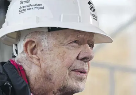  ?? ED KAISER ?? Former U.S. president Jimmy Carter took time for an interview during a break from the Habitat for Humanity house constructi­on at the Carter Place build in southeast Edmonton on Tuesday.