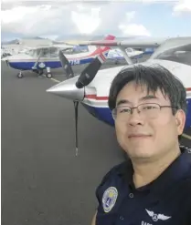  ?? ?? Captain Darryl Barret Ng stands among CAP planes.