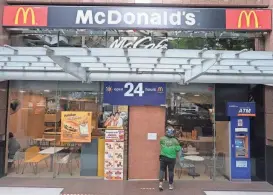  ?? DAVID COHEN/AP ?? System failures at some McDonald’s locations were reported worldwide on Friday, shuttering restaurant­s from Bangkok to London for hours and leading to social media complaints.