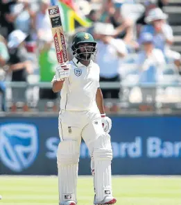  ?? Picture: SHAUN ROY/GALLO IMAGES ?? GOOD KNOCK: Temba Bavuma raises his bat after reaching his 50 during the 2nd Test match against Pakistan.