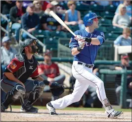  ?? Tribune News Service ?? Above, Jared Hoying (31) launches a solo home run during the third inning against the Arizona Diamondbac­ks in a spring training game on Tuesday, Feb. 28, 2017 in Surprise, Ariz.