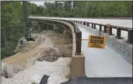  ?? (NWA Democrat-Gazette/Charlie Kaijo) ?? A walkway on the new bridge at Pruitt is almost ready for use. The bridge also has about 12 feet of clearance underneath, high enough for horseback riders to stay on the Old River Trail. Previously, they had to make a dangerous crossing on the old bridge.