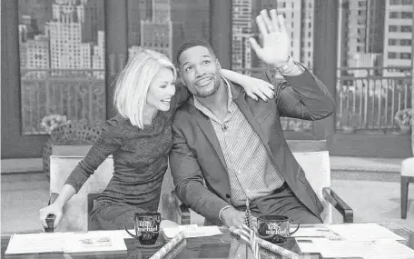  ?? Associated Press ?? Michael Strahan’s last day co-hosting “Live! With Kelly and Michael” with Kelly Ripa was May 13. He now co-hosts “Good Morning America.”