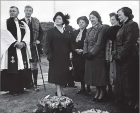  ??  ?? William Harvey’s widow – and Susan Simpson’s grandmothe­r – Margaret, wearing a broach on her coat, with No 4 Commando widows Peggy Wells and Jean Keenan meeting the Queen Mother at the unveiling of Spean Bridge Memorial. Lord Lovat is in the kilt.