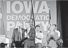  ?? DANIEL ACKER, BLOOMBERG ?? Bernie Sanders, left, Martin O’Malley and Hillary Clinton attend a Democratic Party event in Cedar Rapids, Iowa, in July.