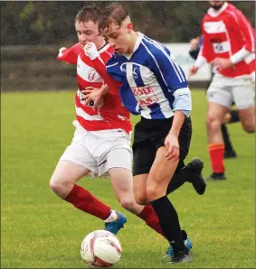  ??  ?? Evan Foley of Moyne Rangers and Danny Cranch of Gorey Rangers battle for possession.